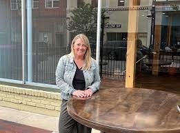 Niki Marengo in front of her store