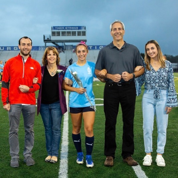 Humans of Greater Cincinnati Post: student with her family on soccer field